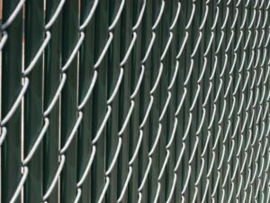 Photo of chain link fence with privacy slats in GA by Accent Fence Co.